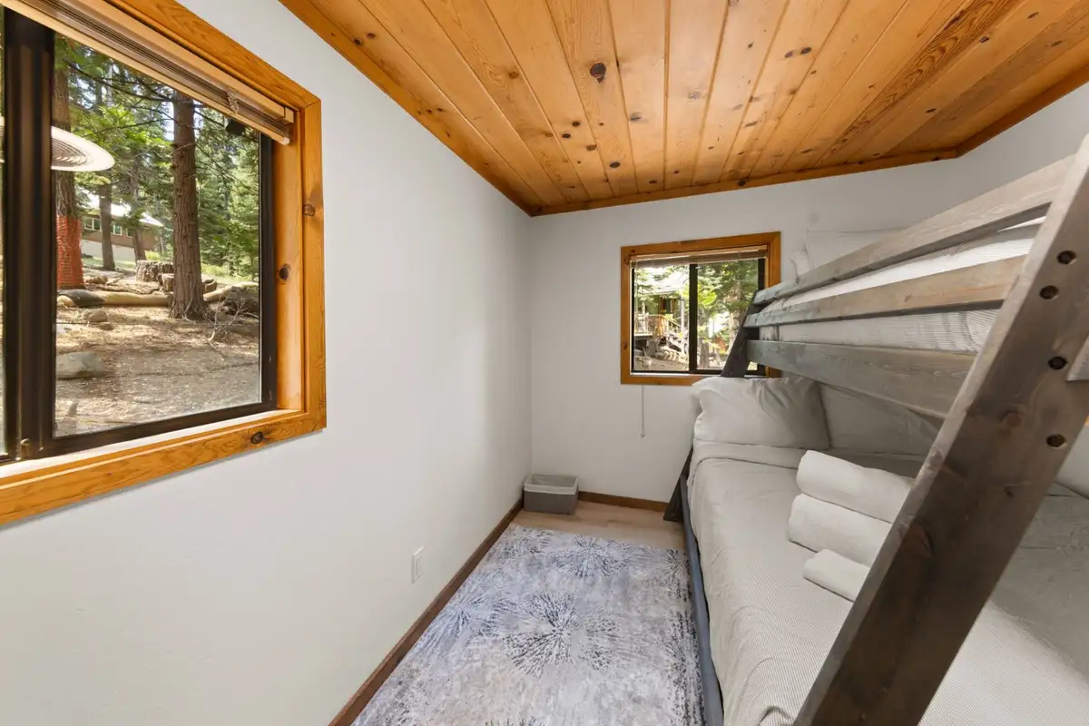Bunk room with a gray bunk bed and pine ceiling, Homewood Cabin in the Pines