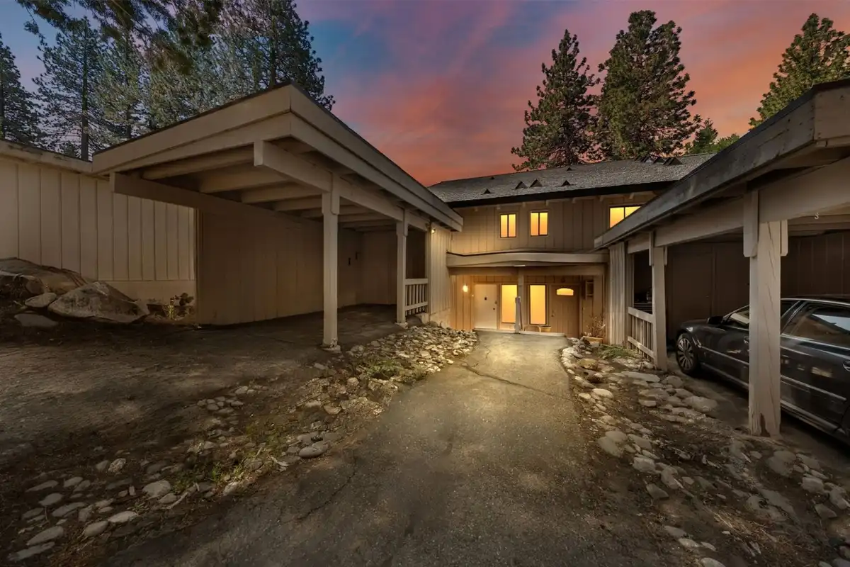 Home exterior with carports at dusk, Skiway Suite