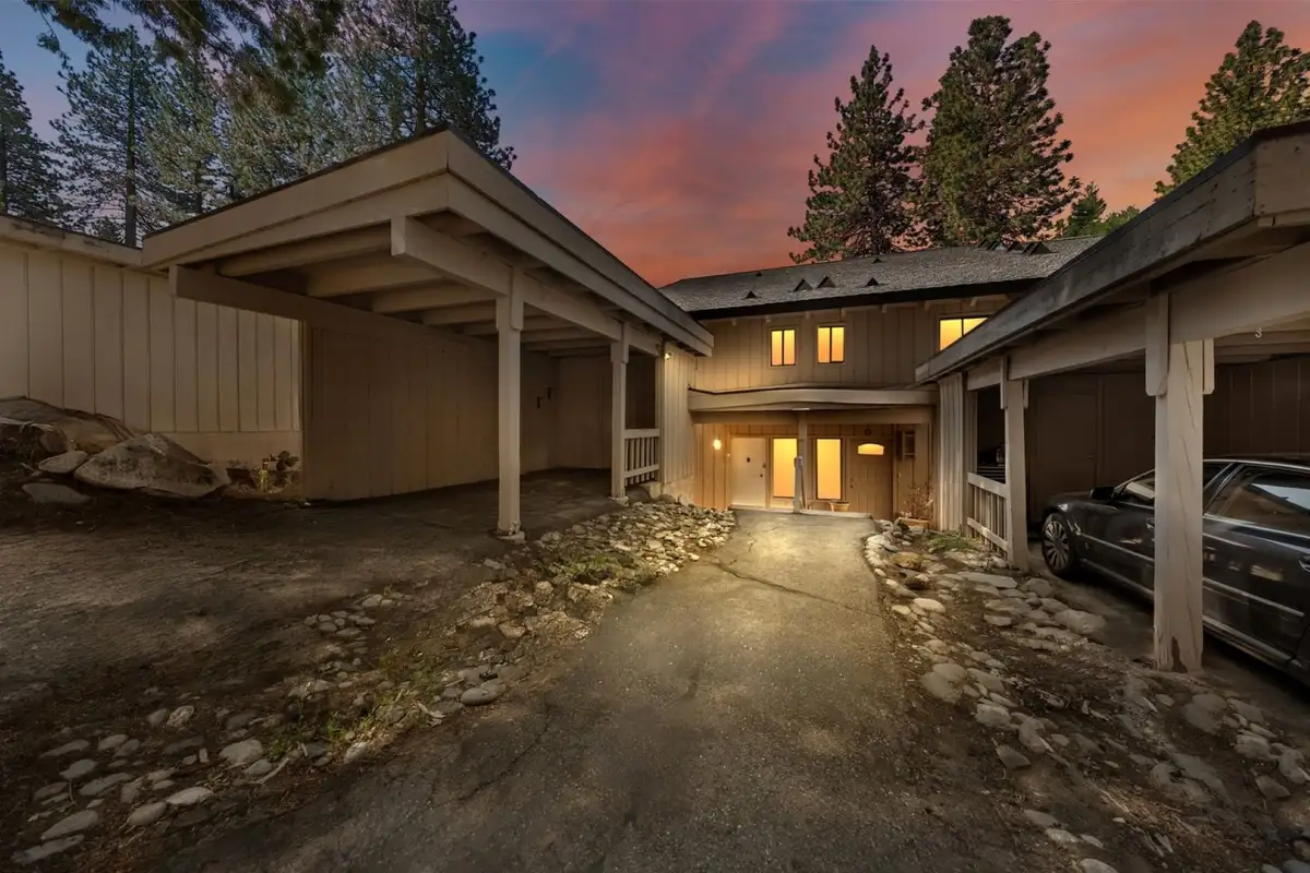 Home exterior with carports at dusk, Skiway Suite