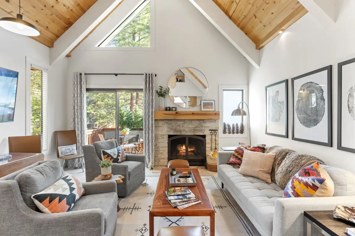 Living room with outdoor view and balcony, Serenity Bungalow