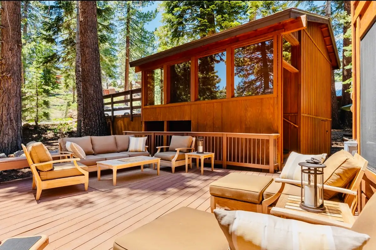 Deck with outdoor sofas and lounge chairs, Sunlit Incline Retreat