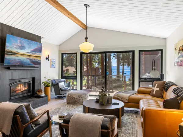 Living room with lake views at Lakeside Luxe Retreat