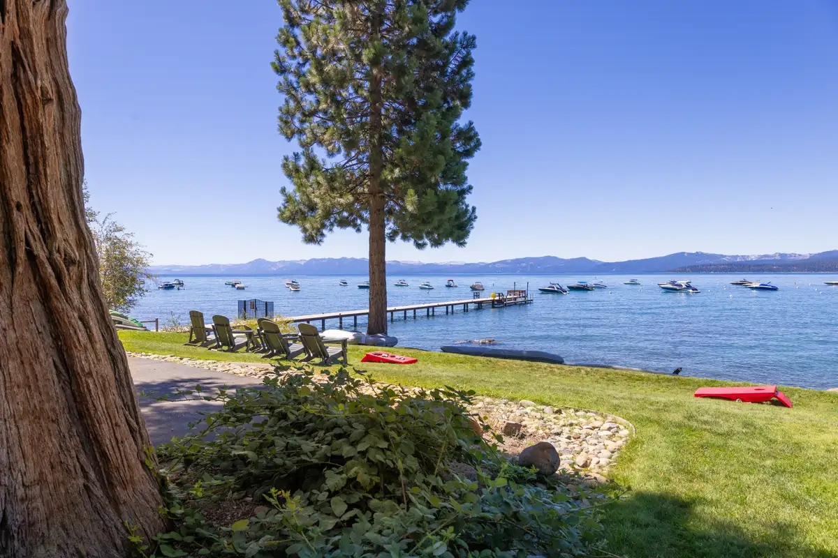 Lawn leading to Lake Tahoe with a pier, Lakeside Luxe Retreat