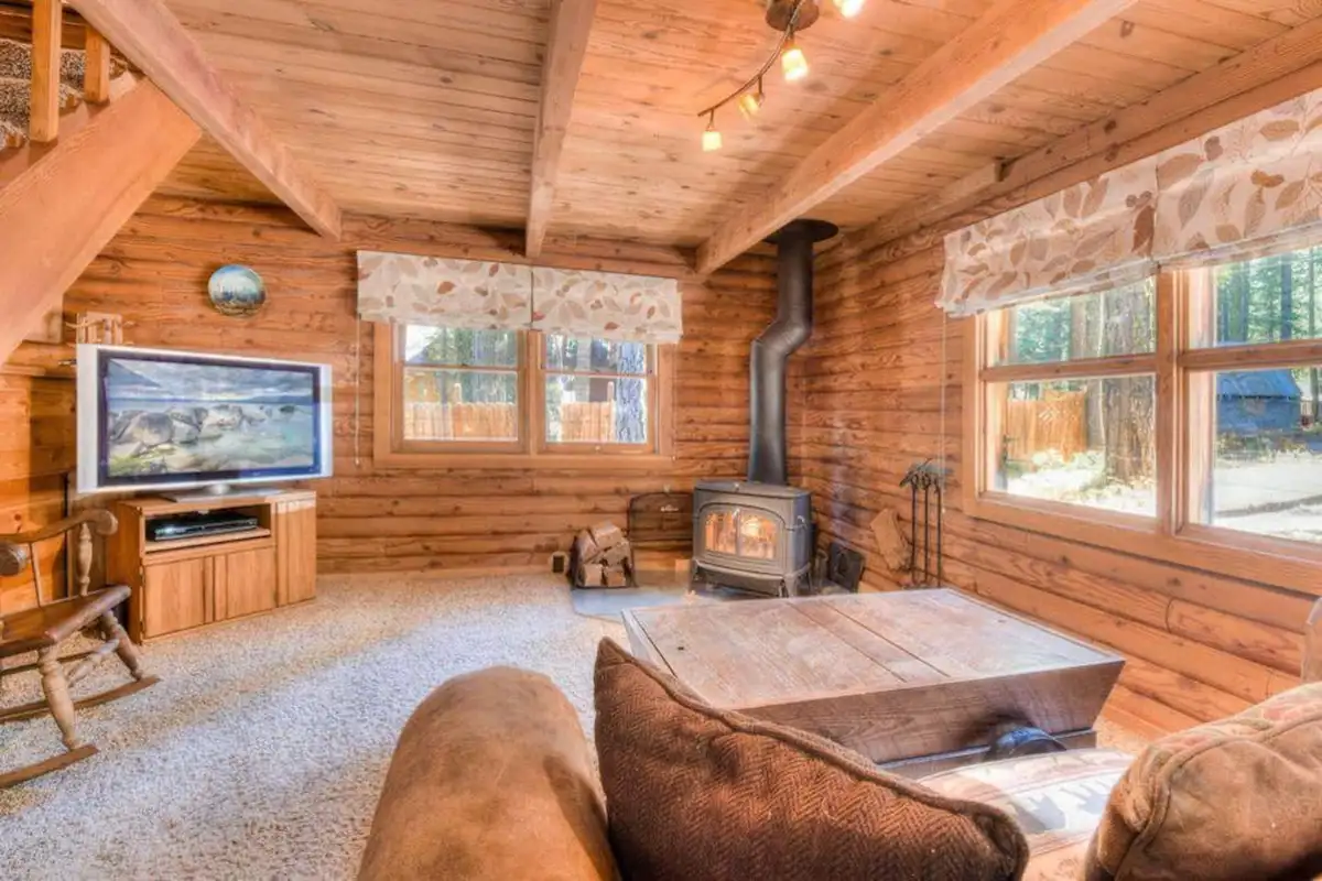 Wooden interior and fireplace warms your heart and make you cozy all time, Enchanted Woods Cabin