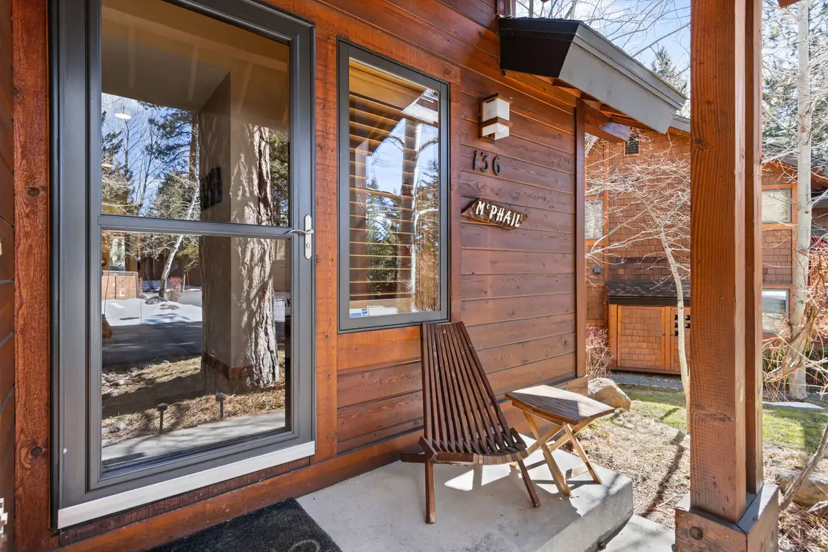 Front entry porch with a wooden chair, Elevated Tahoe Escape