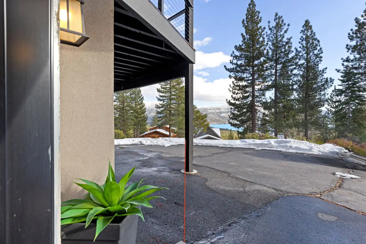 Driveway view toward pines and distant mountains, Incline Lakehouse Lookout
