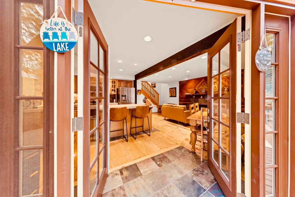 Open French doors into the kitchen and living area, Sunlit Incline Retreat