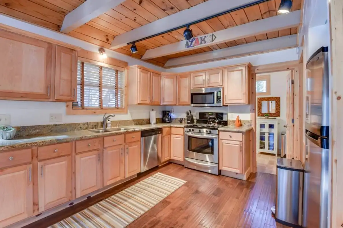 Cooking a meal in the newly renovated, spacious and immaculate kitchen, Tranquil Trails Cabin