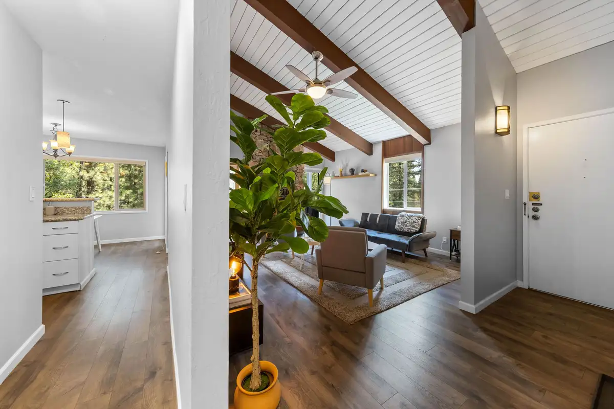 Entry view into a living room with beamed ceiling, Incline Tranquil Loft