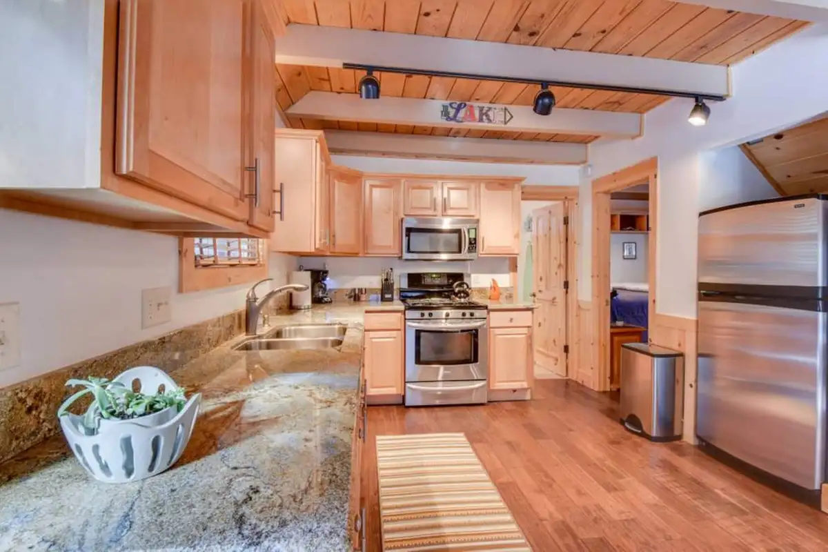 Kitchen with granite counters and stainless appliances, Tranquil Trails Cabin