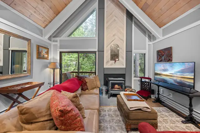 Living room with outdoor view and balcony