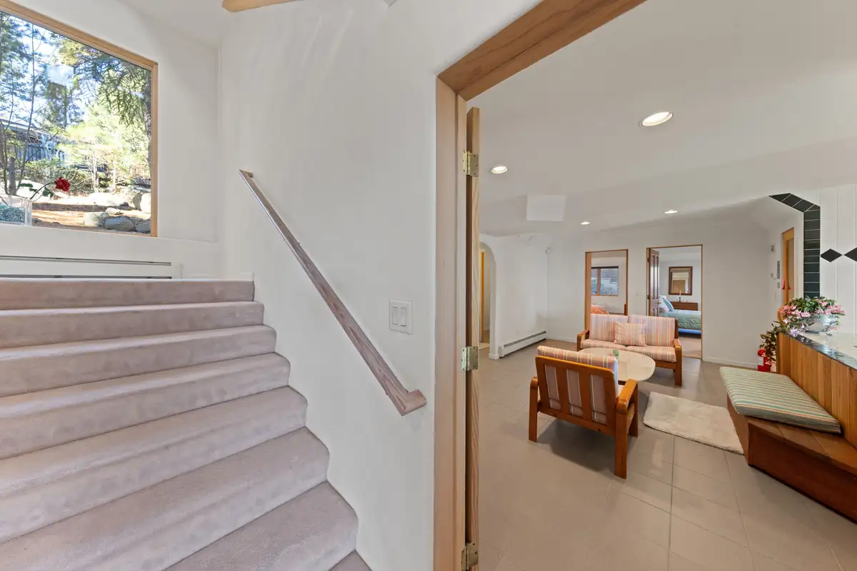 Stairway leading down to a lounge area, 90s Tahoe Time Capsule