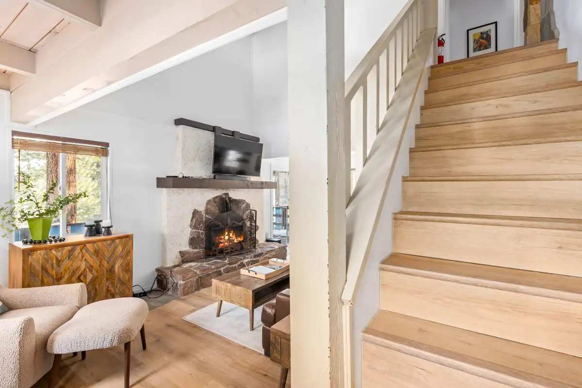 Living room with stairs leading to second floor, Mountaintop Retreat