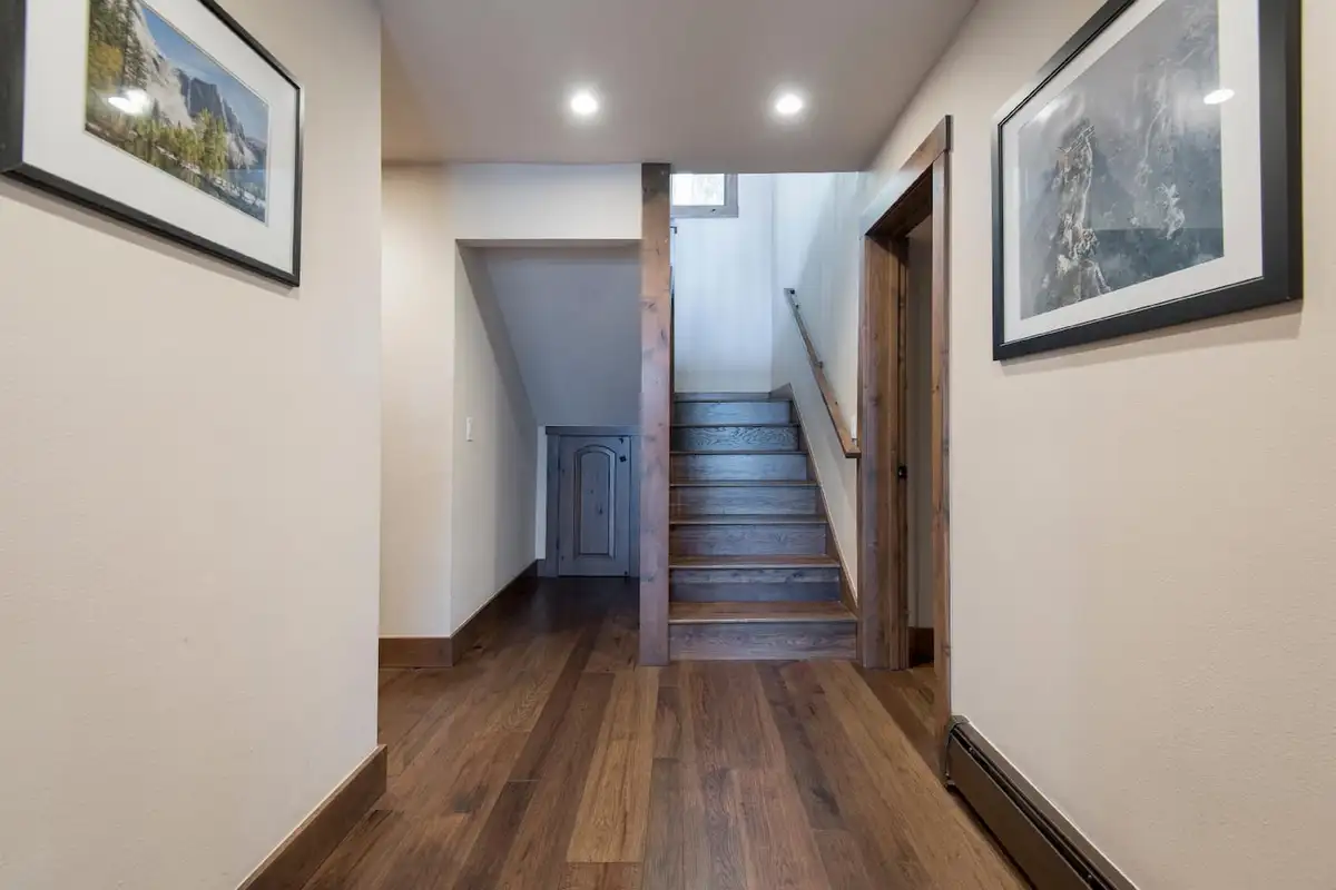 Hallway with wood floors and stairs, Tranquil Tahoe Haven