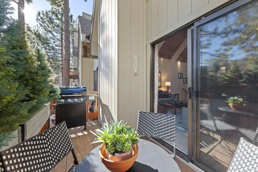 Balcony with grill and patio table among pines, Serenity Bungalow