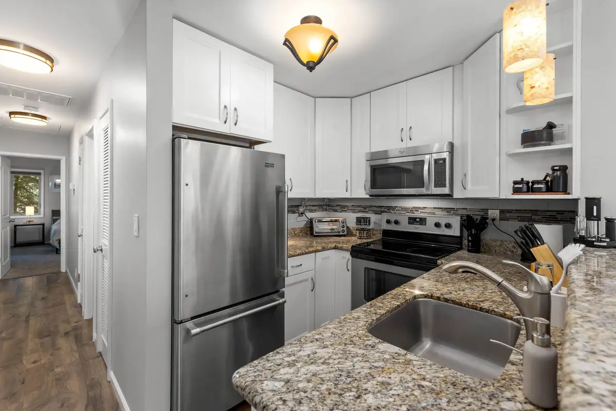 Kitchen with stainless refrigerator and granite counters, Incline Tranquil Loft