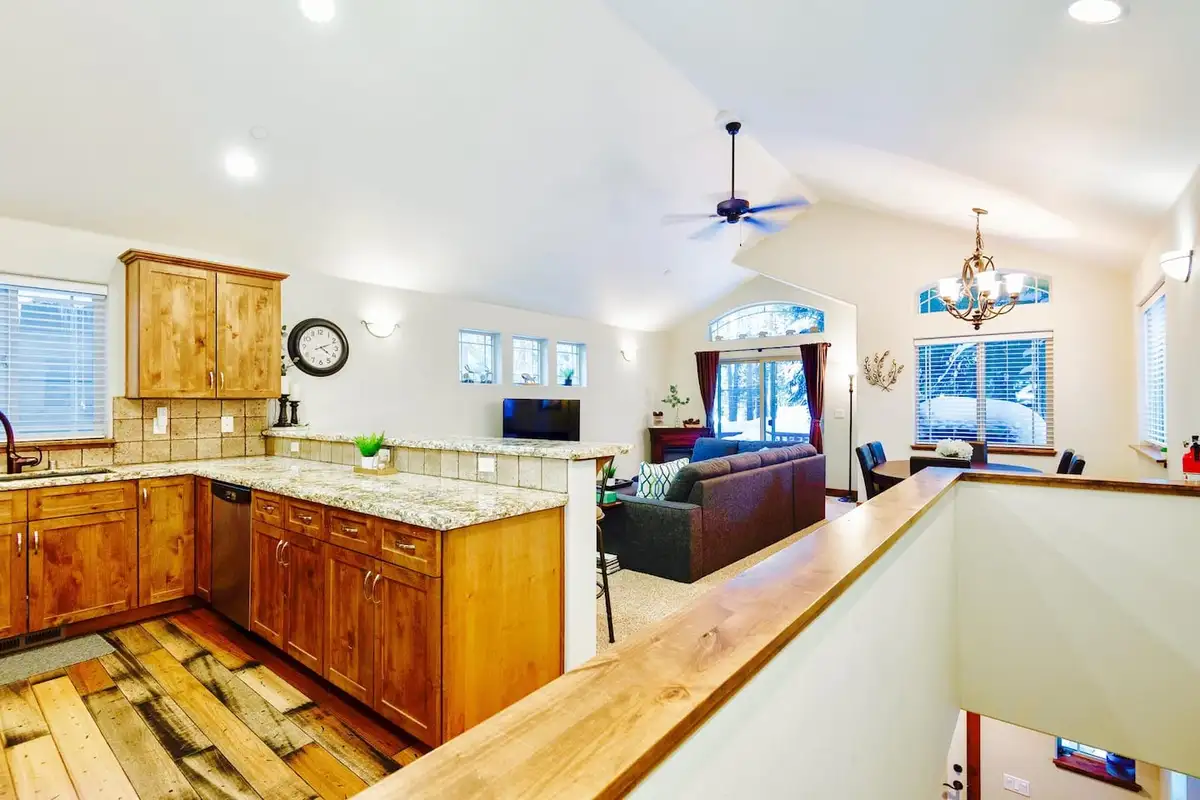 Open kitchen and living area seen from the upper landing, Trout and About