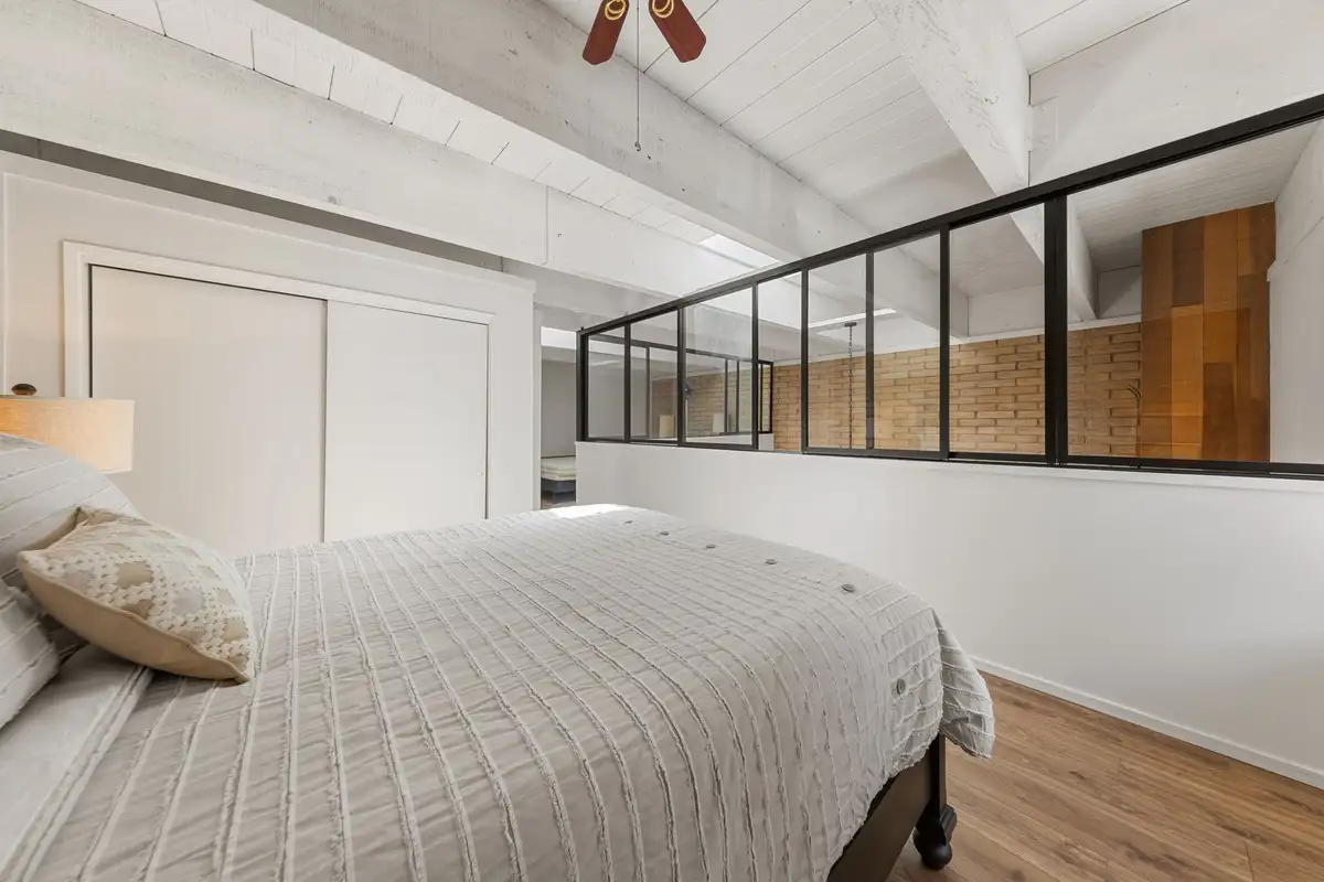 Loft sleeping area with interior windows overlooking the living room, Treetop on Country Club