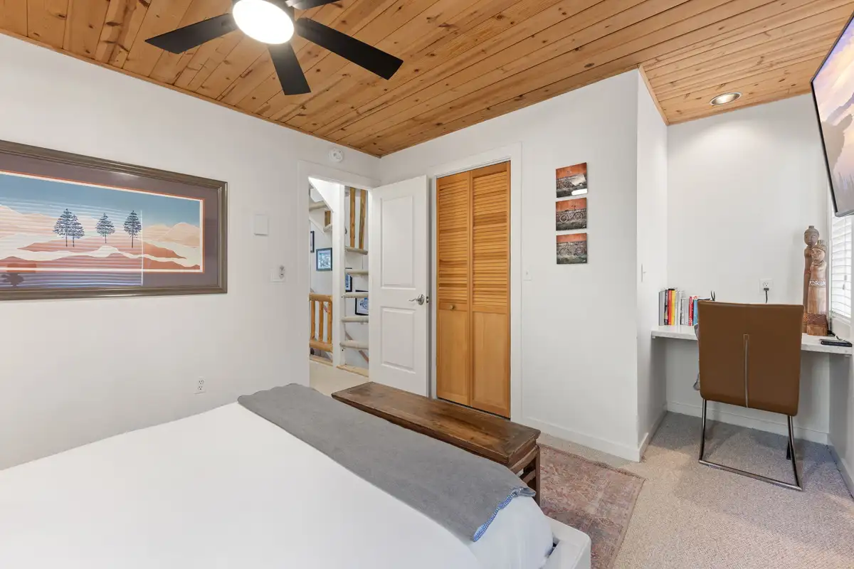 Bedroom with a desk and wood ceiling with fan, Serenity Bungalow