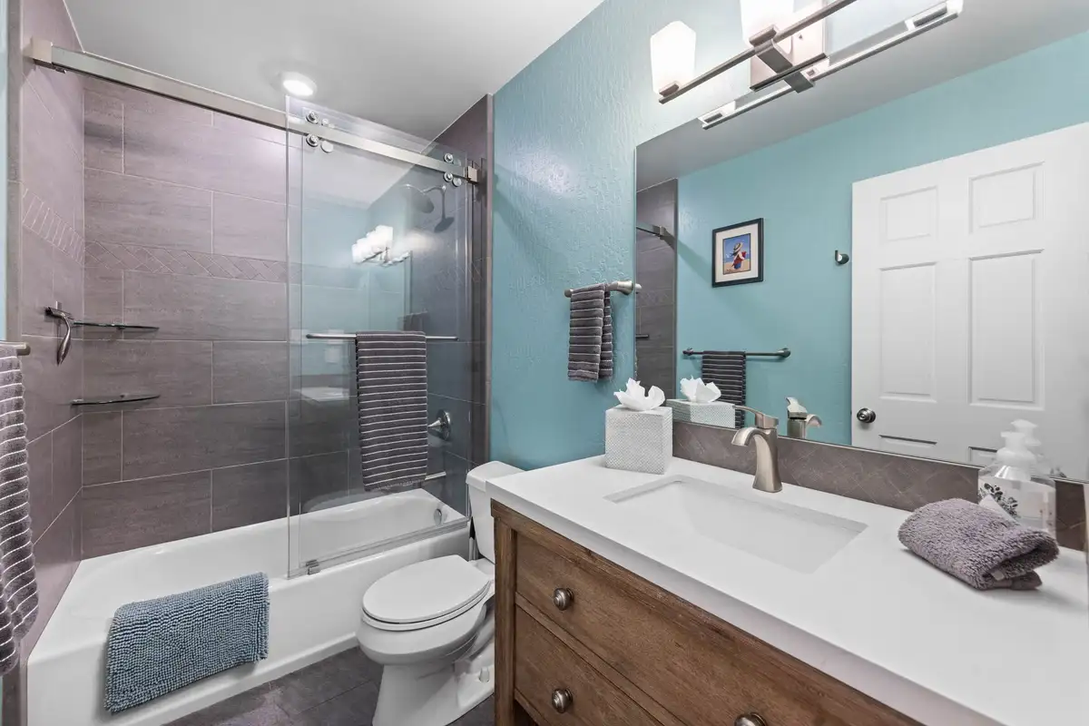 Bathroom with a tub-shower and double vanity, Tahoe Peaks & Shores Retreat