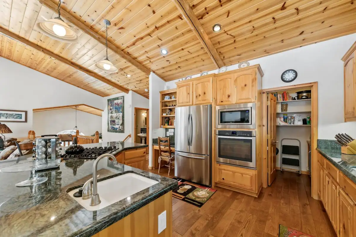 Kitchen with stainless double ovens and a walk-in pantry, Hastings Hideaway Cabin
