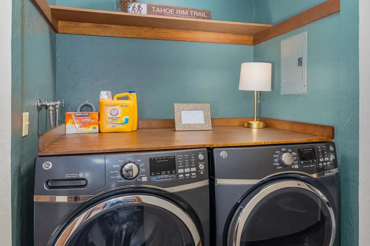 Laundry nook with front-load washer and dryer, Grand Regency Retreat