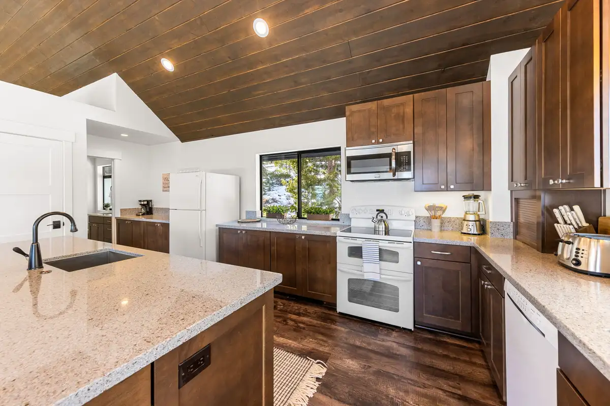 Kitchen with quartz counters and dark wood cabinets, Incline Lakehouse Lookout