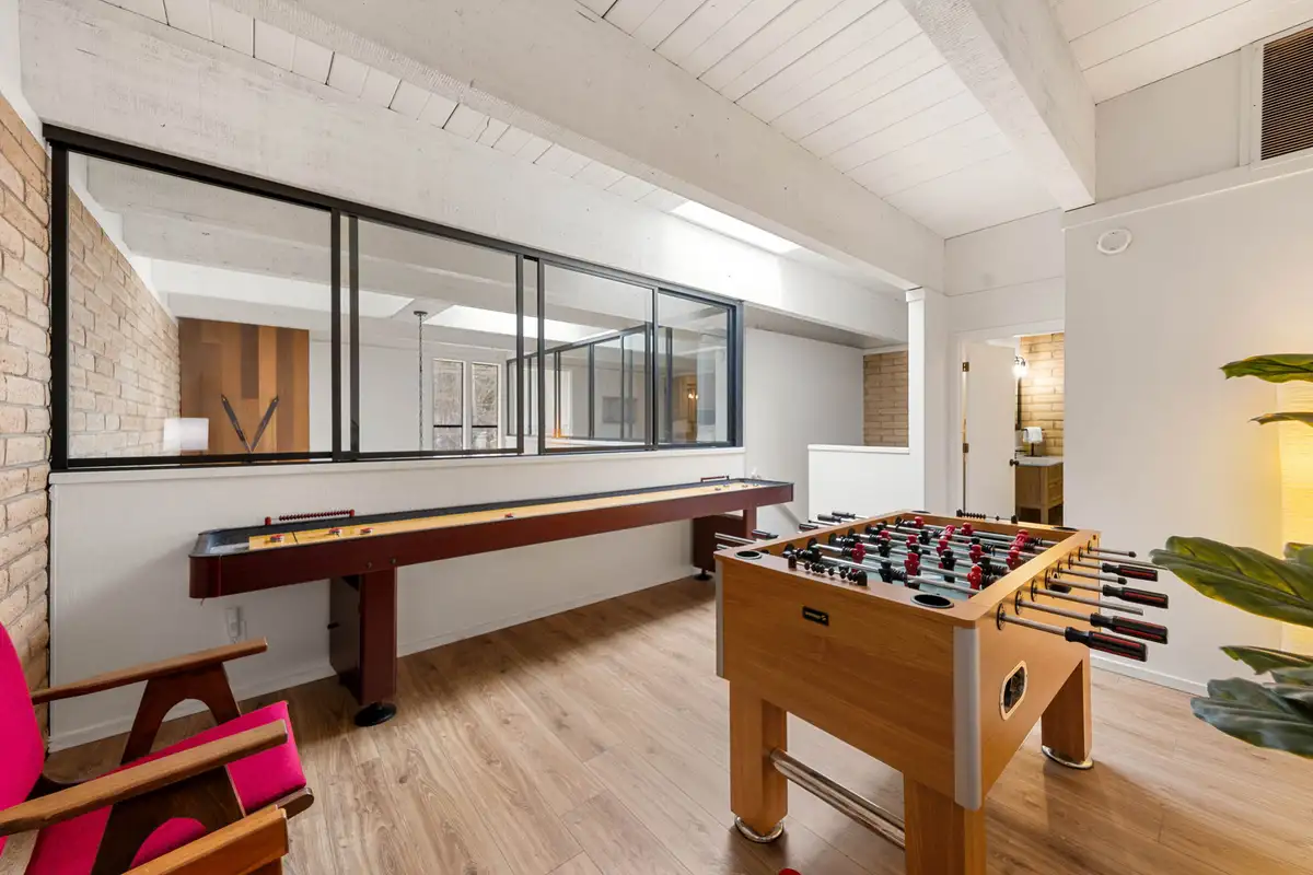 Game room with shuffleboard and foosball tables, Treetop on Country Club