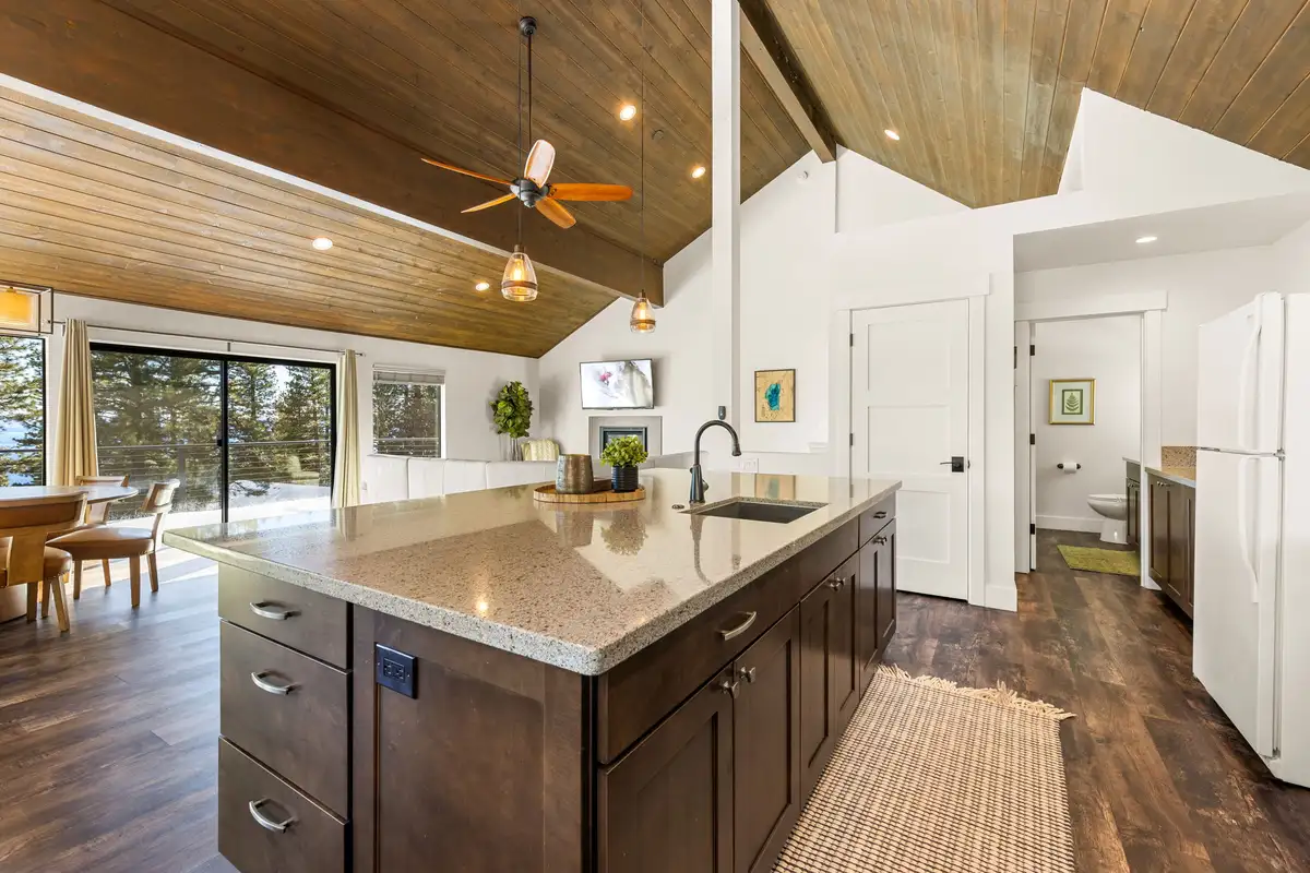 Kitchen island with ceiling fan and windows behind, Incline Lakehouse Lookout