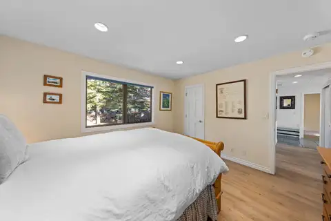 Bedroom with a bed with white bedding and a window, Tranquil Alpine Bliss