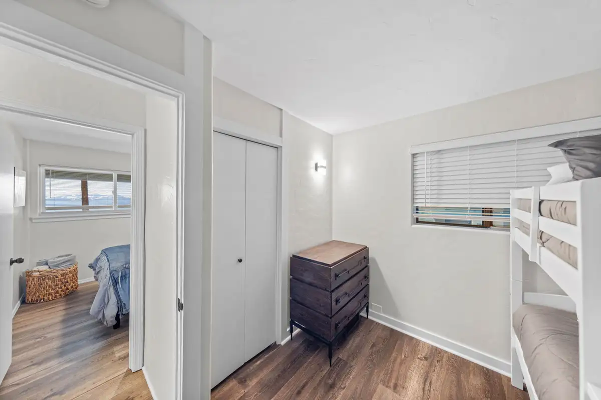 Bedroom with bunk beds and a small dresser, Lakeview Haven in Incline Village