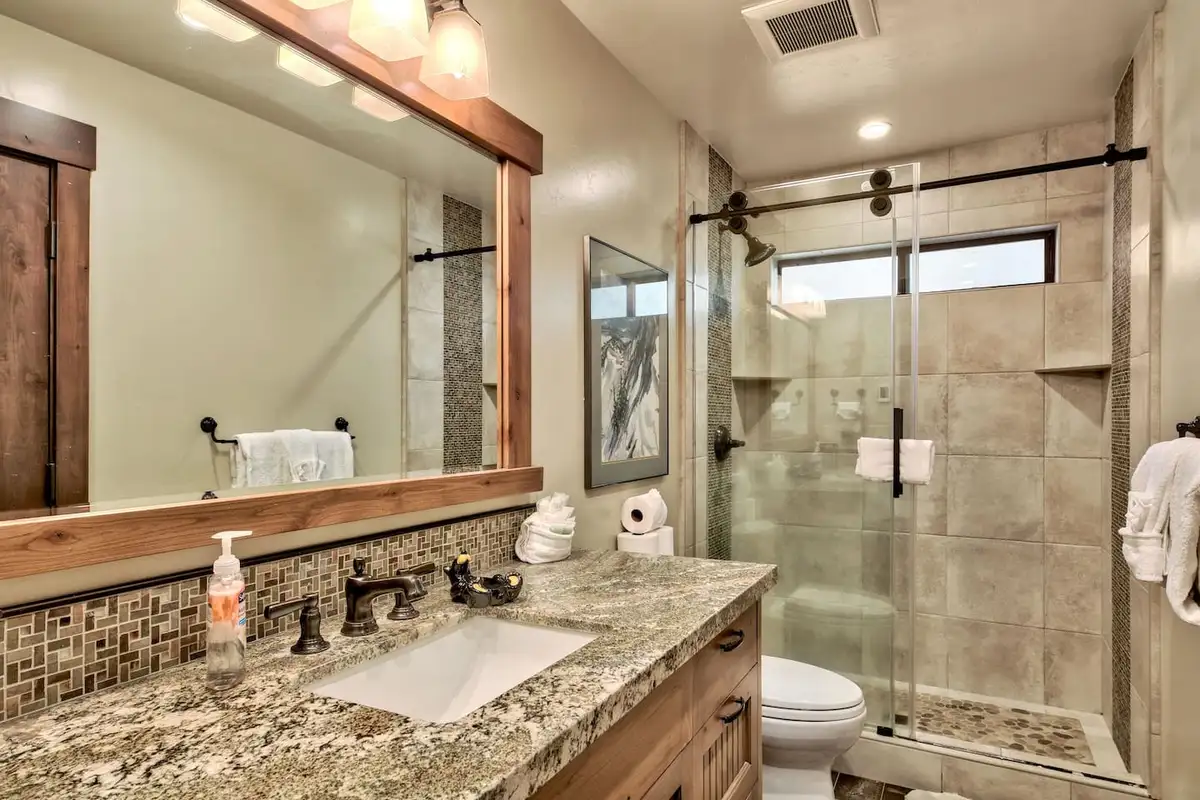 Bathroom with granite vanity and glass walk-in shower, Mammoth Haven Retreat