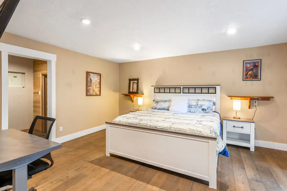 Bedroom with a white bed frame and a desk, Tranquil Stay