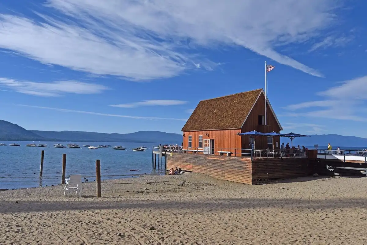 Boathouse building on a sandy Lake Tahoe beach, Enchanting Chamberlands Cabin