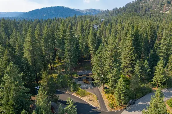 Aerial view of a home surrounded by pine forest, Sugar Pine Tahoe Lodge