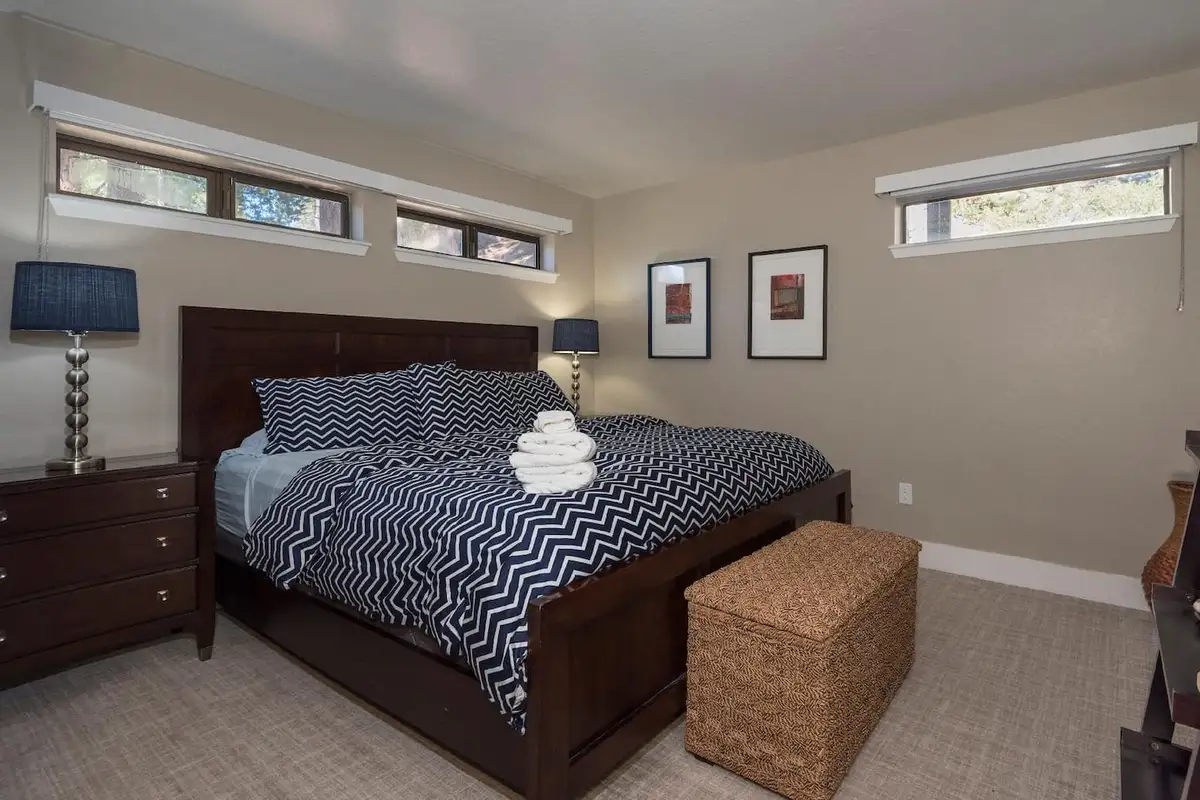 Bedroom with chevron bedding and clerestory windows, Skylake Serenity Retreat