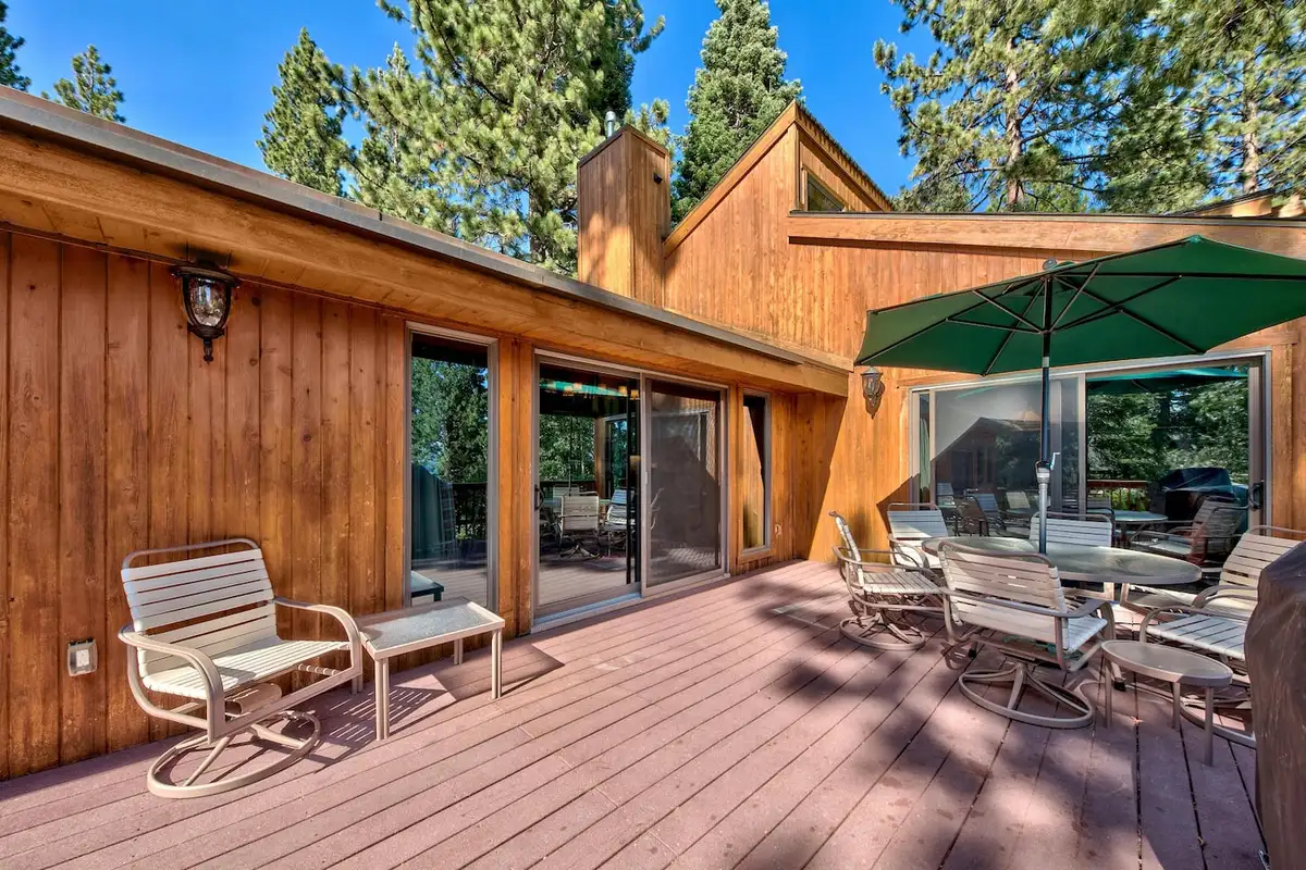Wood deck with patio furniture and umbrella, Mammoth Haven Retreat