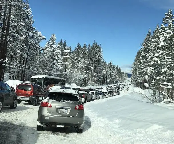 Cars on a snowy mountain road at Lake Tahoe