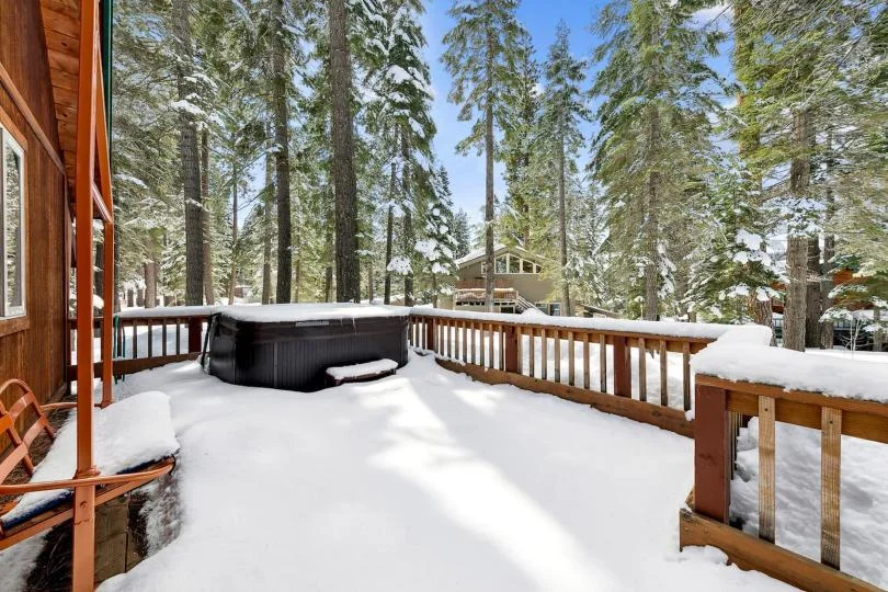 Outdoor seating and dining on the deck at Patton's Pfeiffer Cabin in Carnelian Bay