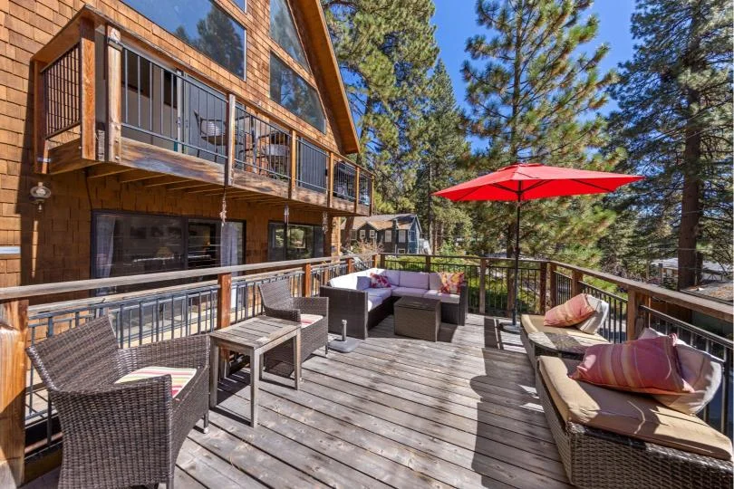 Outdoor seating and dining on the deck at Rustic Ridge Retreat in Kings Beach