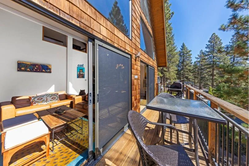 Large outdoor deck at Rustic Ridge Retreat overlooking the Sierra Nevada in Kings Beach
