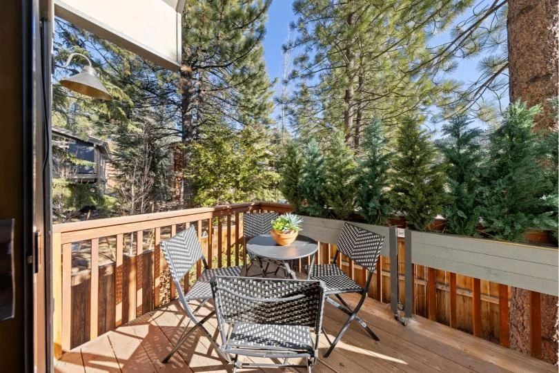 Outdoor seating and dining on the deck at Serenity Bungalow in Incline Village