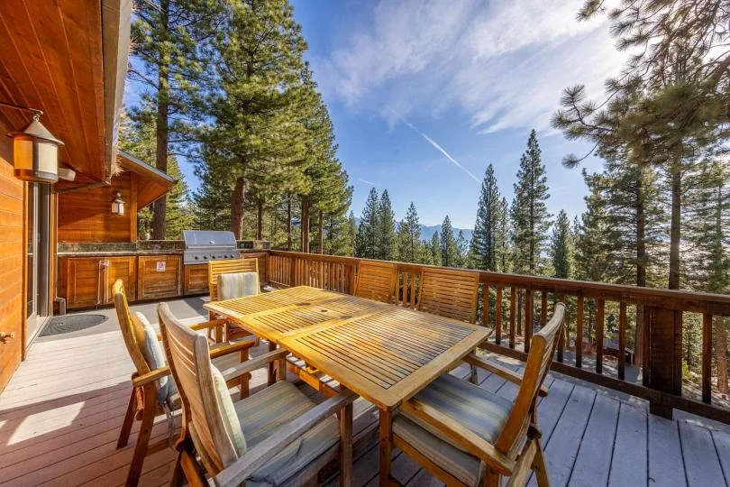 Outdoor seating and dining on the deck at Tranquil Alpine Bliss in Incline Village