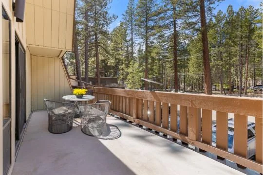 Large outdoor deck at Treetop on Country Club overlooking the Sierra Nevada in Incline Village